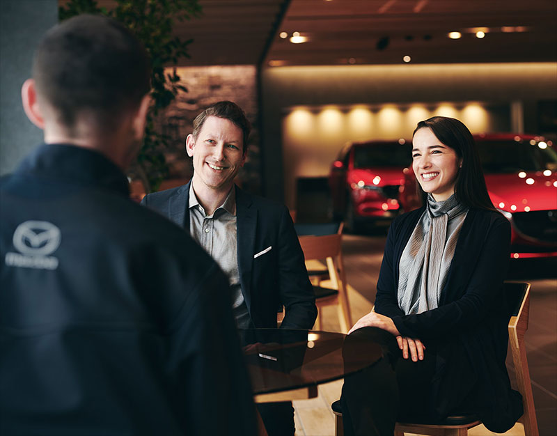 Customers exploring Mazda Leasing Options
